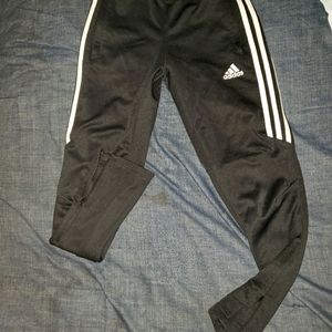 Adidas joggers with zip pocket and zippered legs